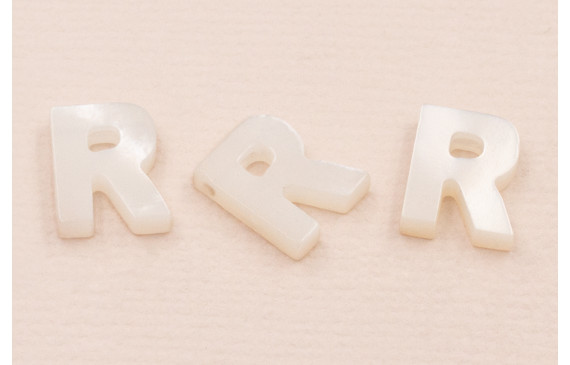 Letra Nacar R 10mm agujero horizontal superior