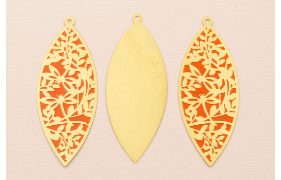 Colgante Ovalado 65*25 Dibujos Naranjas en Latón