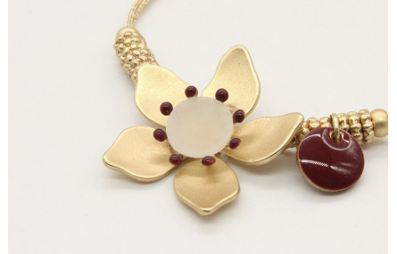 Pulsera hilo macrame oro palido con ruedas estriad