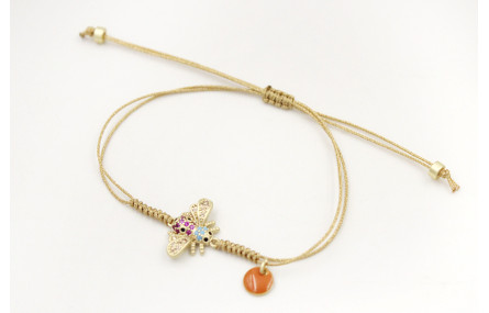 Pulsera nudo serpiente con hilo oro pálido con abe