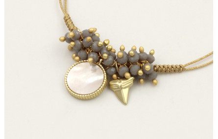 Pulsera hilo dorado palido con colgante disco dora