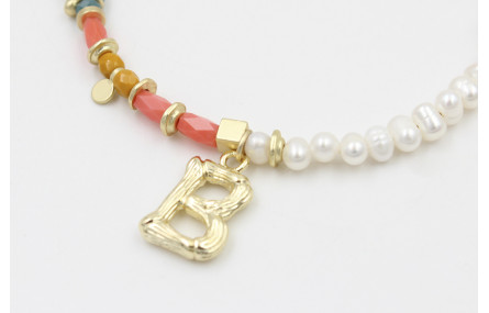 Pulsera con tubos facetados salmón, bolas mostazas