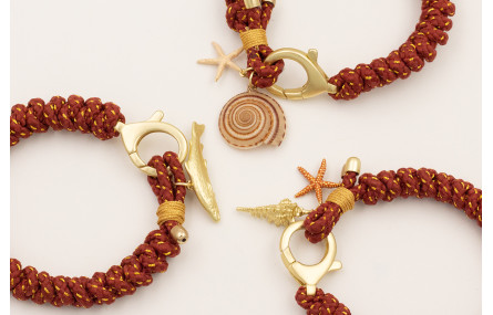 Pulsera de cordón marrón hilo dorado con nudo serp