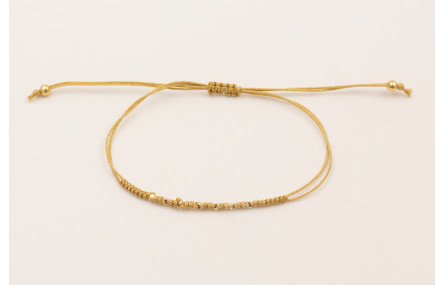 Pulsera hilo macramé dorado con mini facetas dorad