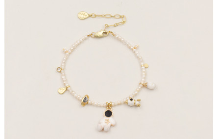 Pulsera astronauta estrelle dorada en el pecho con