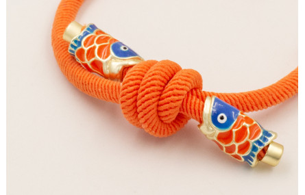 Pulsera cordón elastico naranja con nudo corredizo