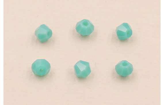Bicono Facetado de 4mm Color Turquesa