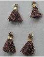 Micro pompon 10mm long. Marrón