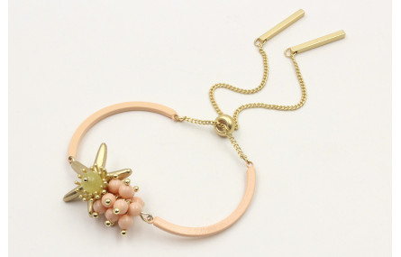 Pulsera semirigida con bolas rositas, estrella oro