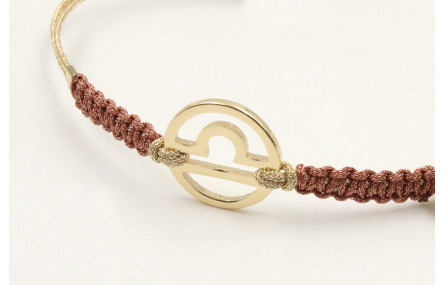 Pulsera hilo macrame oro palido con nudo oro rosa
