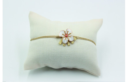 Pulsera nudo serpiente en color oro palido con flo