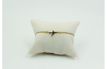 Pulsera de macrame en color oro palido y avión dor