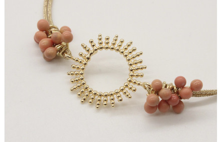 Pulsera macrame oro palido con sol central y alfil