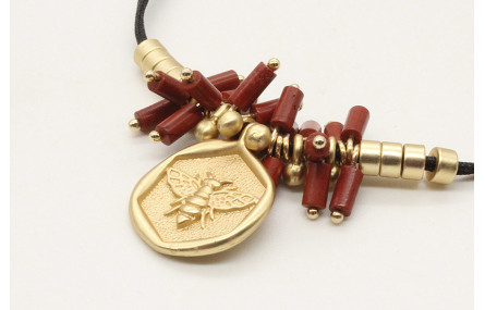 Pulsera hilo macrame nego con tubos marrones, colg