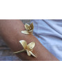 Pulsera con 2 flores en oro mate.