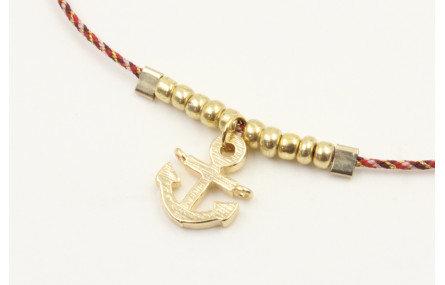 Pulsera hilo granate,oro y microdrusa oro rosa nud