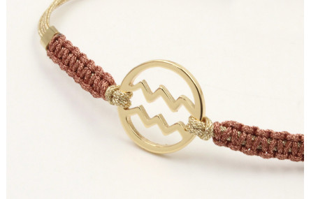 Pulsera hilo macrame oro palido con nudo oro rosa 