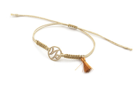 Pulsera hilo macrame oro palido con nudo dorado di