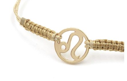 Pulsera hilo macrame oro palido con nudo dorado di