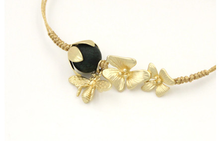 Pulsera nudo serpiente oro pálido con duo de flore