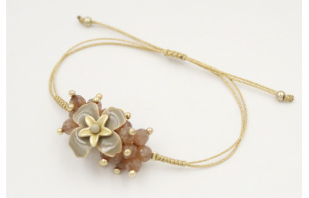 Pulsera nudo serpiente oro palido con burruño face