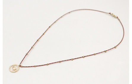 Solitario con hilo micro driza granate,oro con col