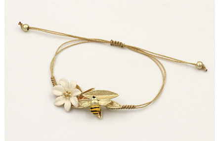 Pulsera hilo dorado palido con nudo serpiente, flo