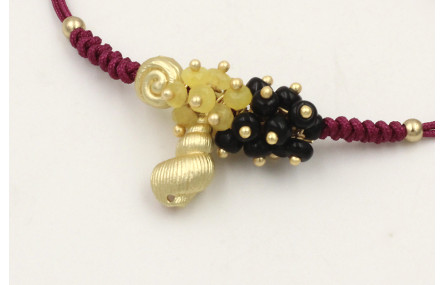 Pulsera hilo granate nudo serpiente con caracolill