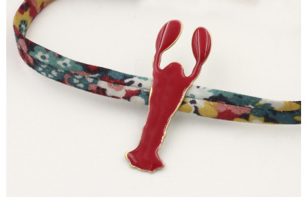 Pulsera lazo liberty azulon con flores rojas,mosta