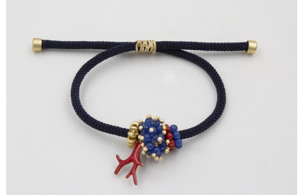 Pulsera de cordón trenzado azul marino con aritos 