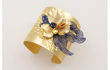 Brazalete rigido flor de loto,pez tropical azul os