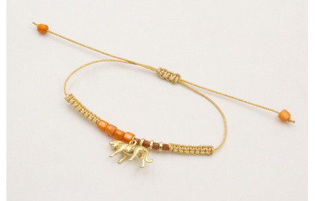 Pulsera hilo metalido dorado palido con nudo macra