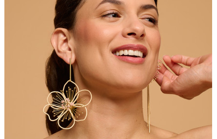 Pendientes asimetricos sol destelleante con ramas