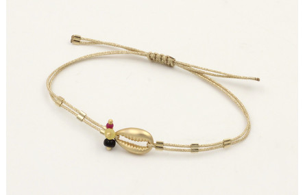 Pulsera hilo dorado palido con tubitos aplastados 