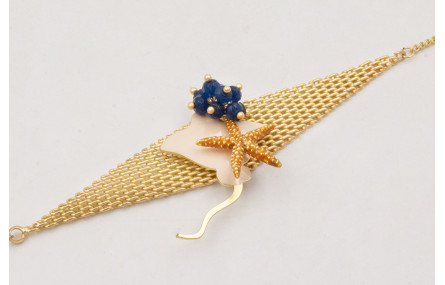 Pulsera malla rombo con manta raya beige,estrella