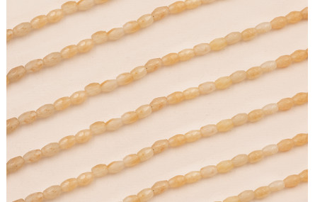 Ristra 40cms Ovalos facetados Piedra 6*4 tostado