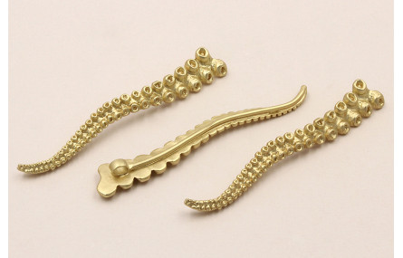 Pieza Pata Pulpo 65*10mm ailla trasera Dorado Mate