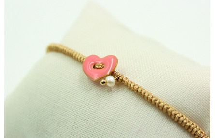 Pulsera entera nudo serpiente oro palido con coraz