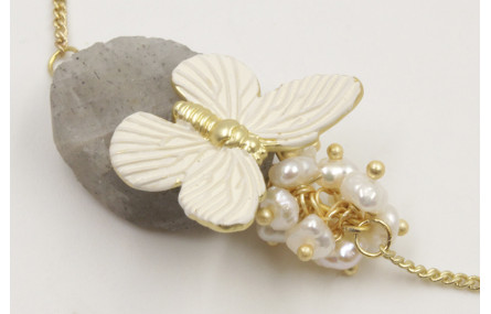 Pulsera eslabón plano dorado mate con flores y bur