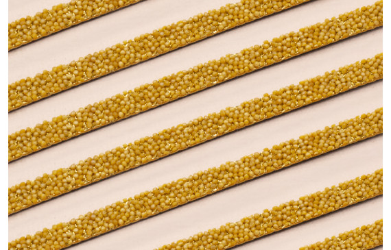Tira de 6mm con bolitas incrustadas Mostaza